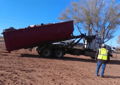 Dump truck unloading at Meadowlake cleanup